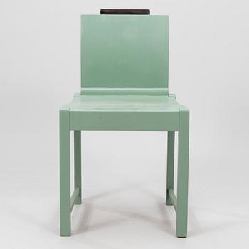 ERIK BRYGGMAN, A wooden chair, 1920's.