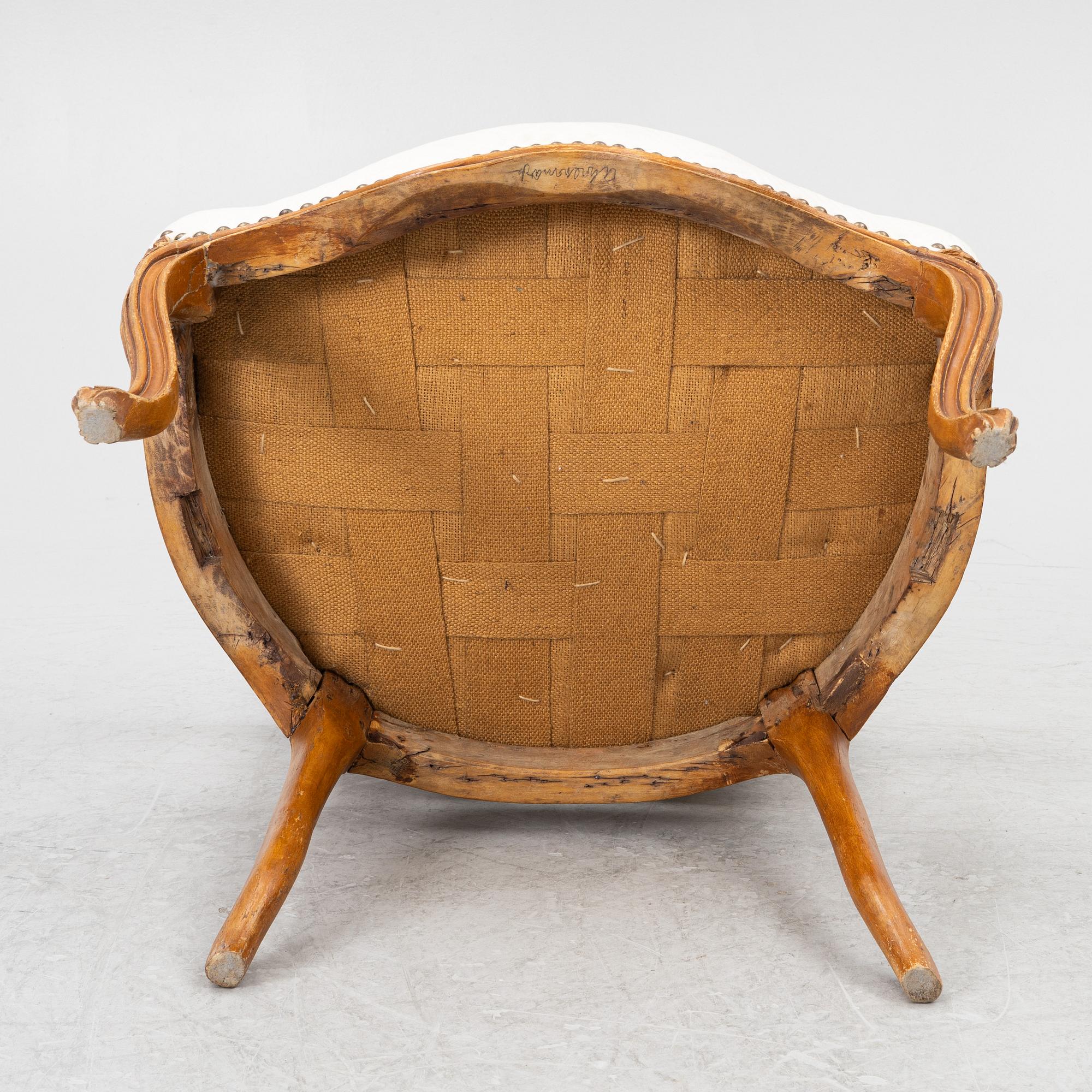 A French Louis XV oåpen back armchair, mid 18th century.