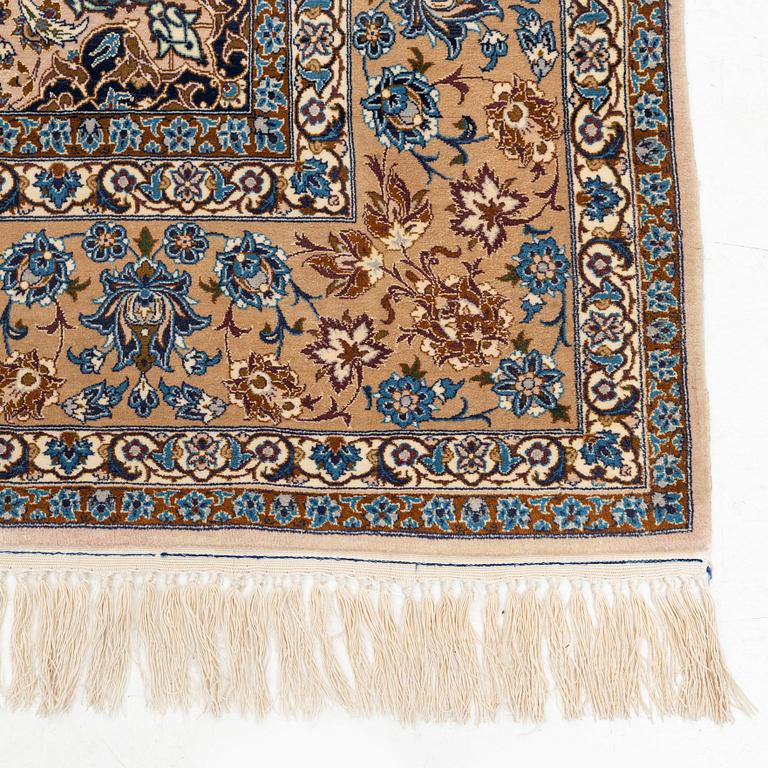 A signed, part silk, Isfahan rug, c. 244 x 149 cm.