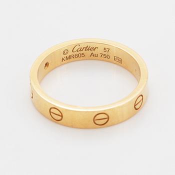 Cartier ring "Love" 18K guld med en rund briljantslipad diamant.