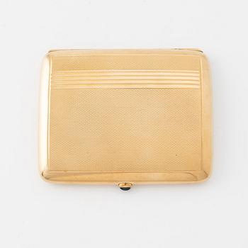 A 14 carat gold cigarette case.