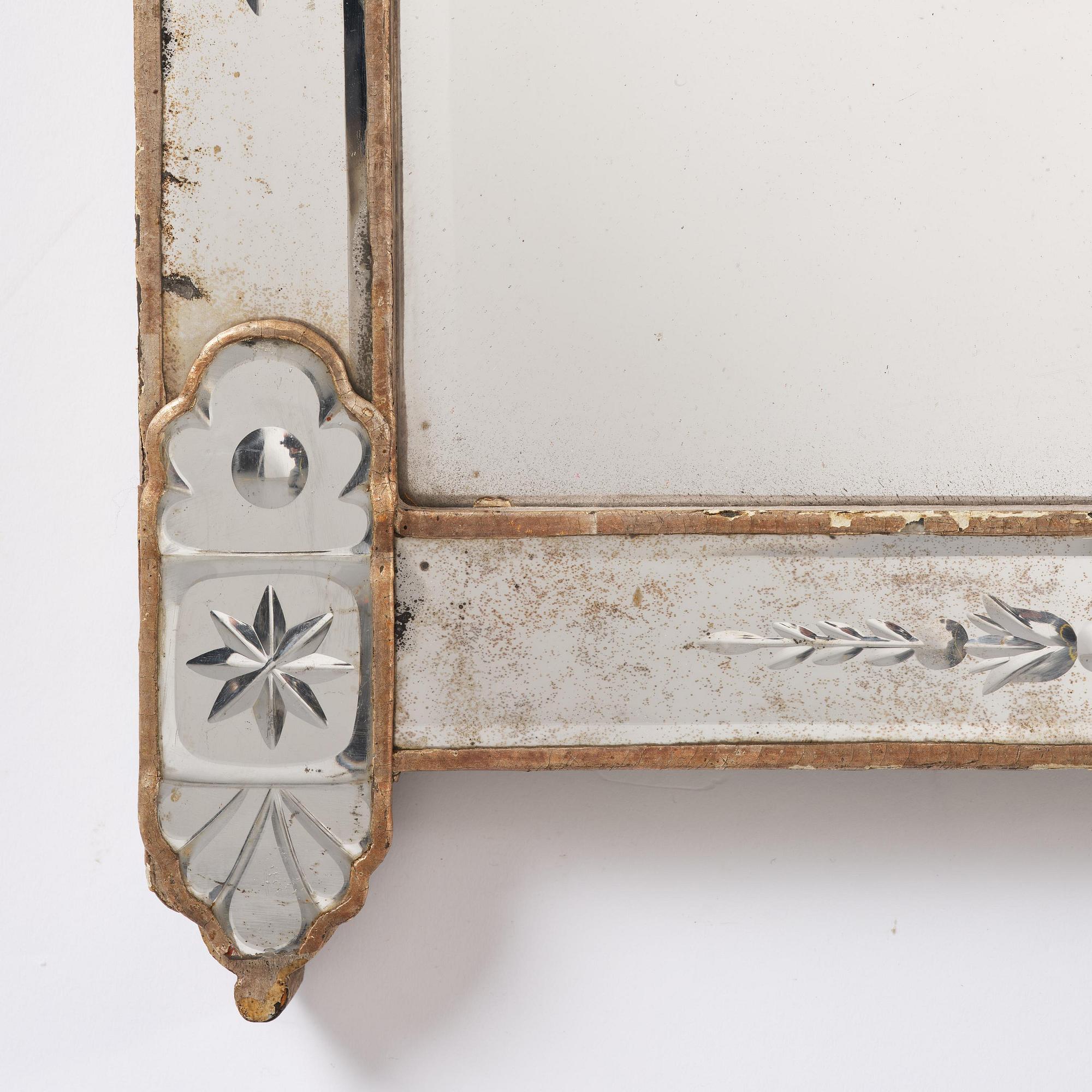 A Northern European late baroque mirror, mid 18th century.