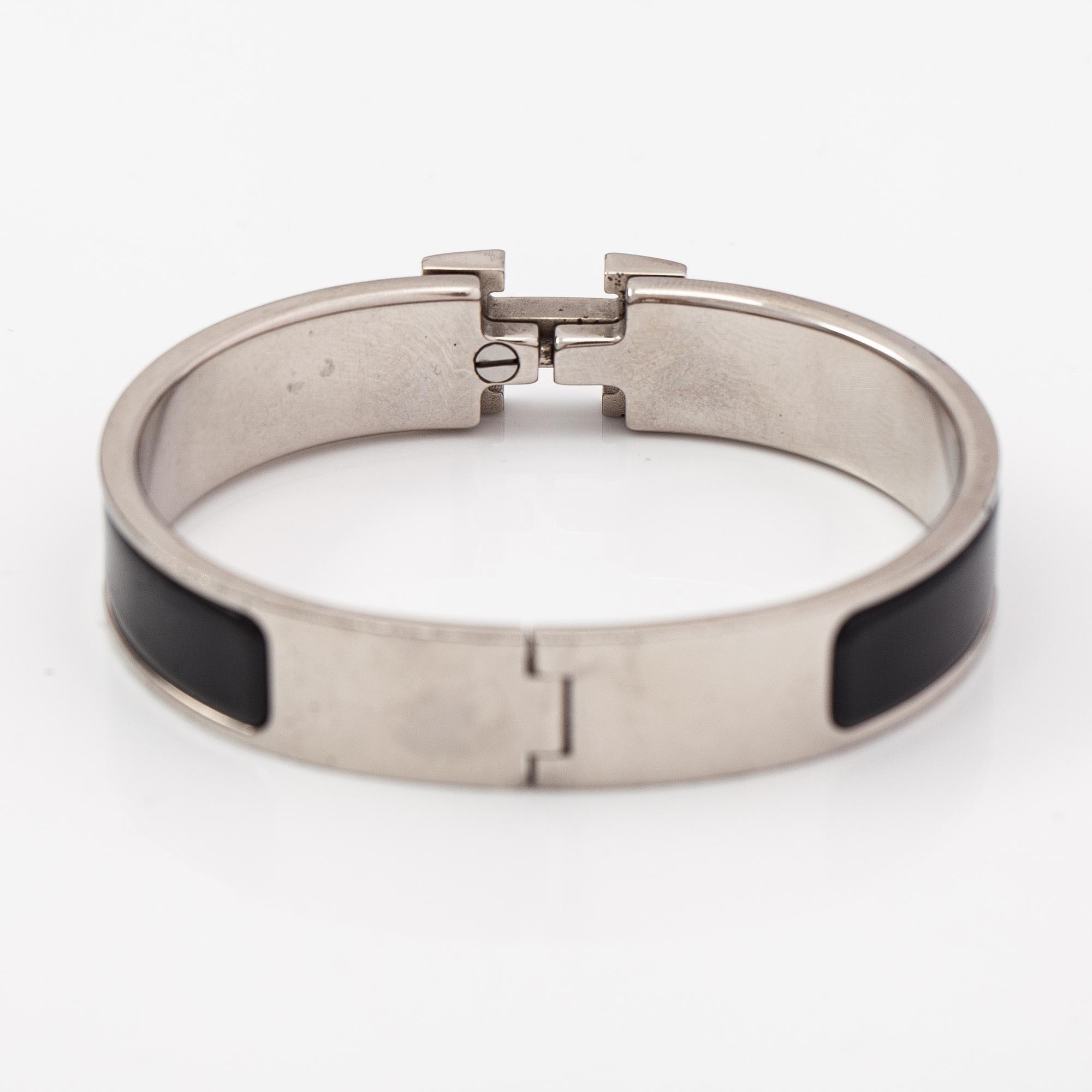 Hermès, armband, "Clic H PM", silverfärgad metall och svart emalj.