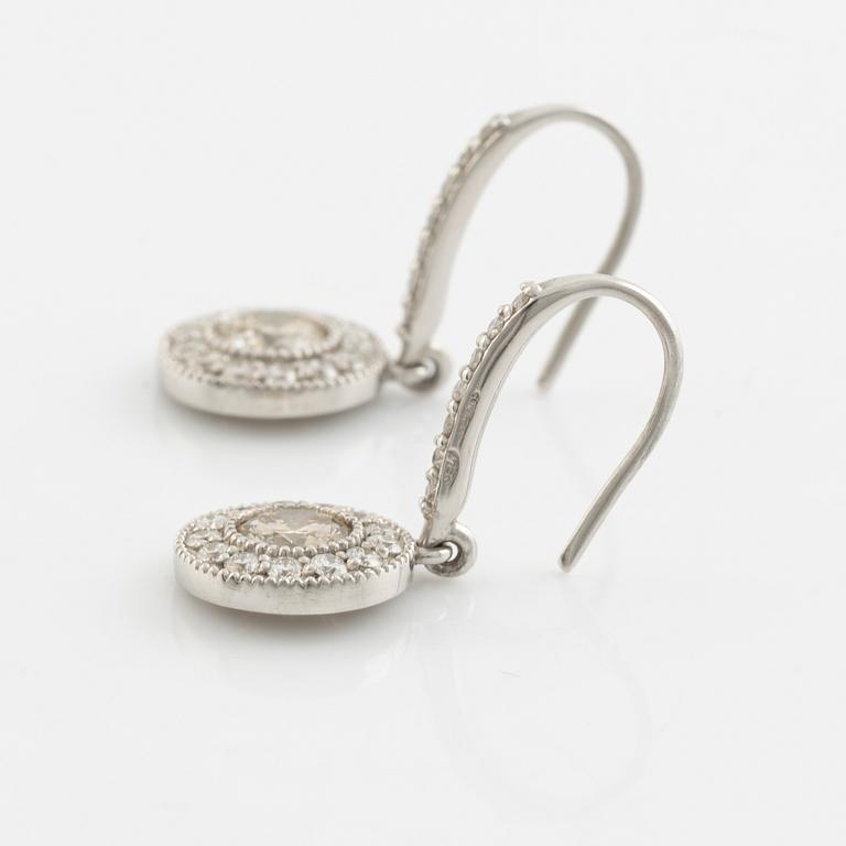 Brilliant cut diamond earrings.
