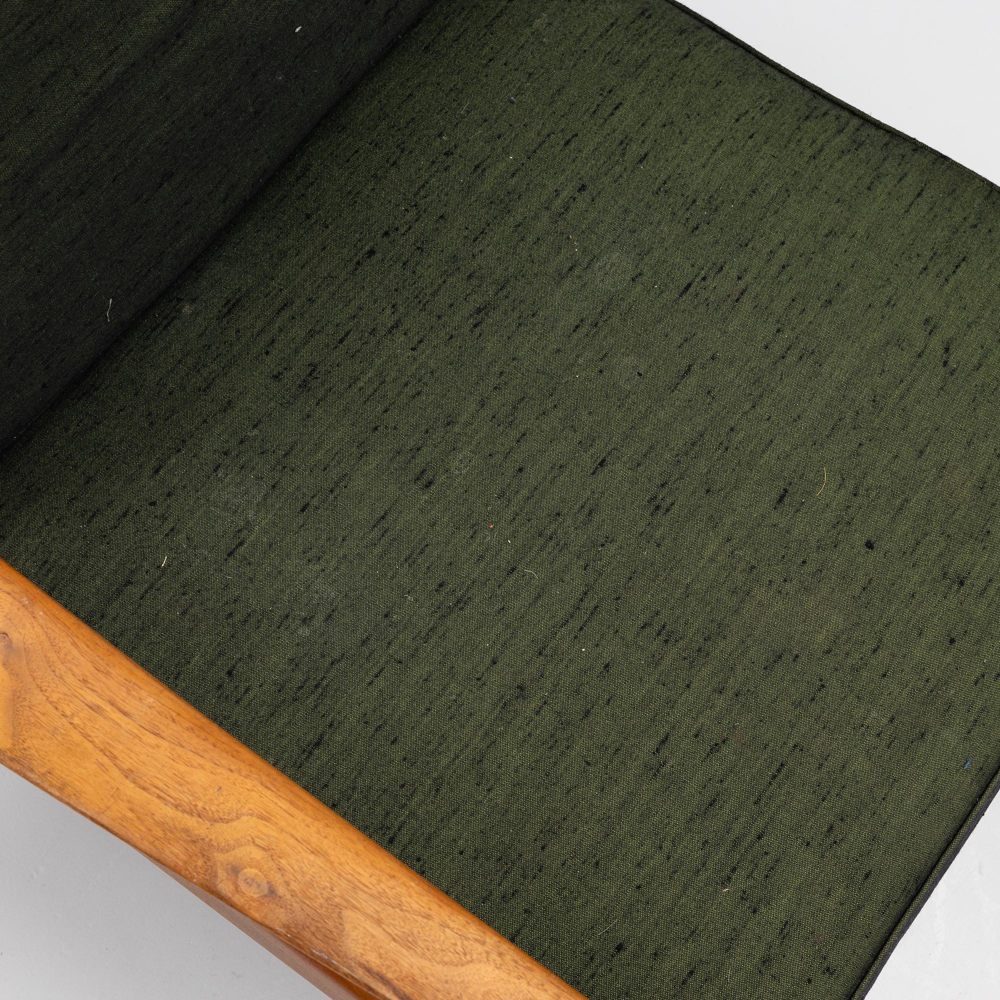 Folke Ohlsson, a pair of 'USA 75' armchairs, Dux, Sweden, 1960's.