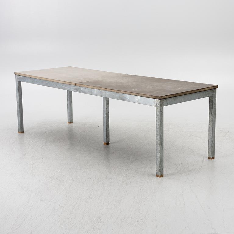 A table, probably MBJ Design.