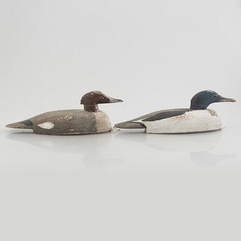 A pair of wood duck decoys, 20th century.
