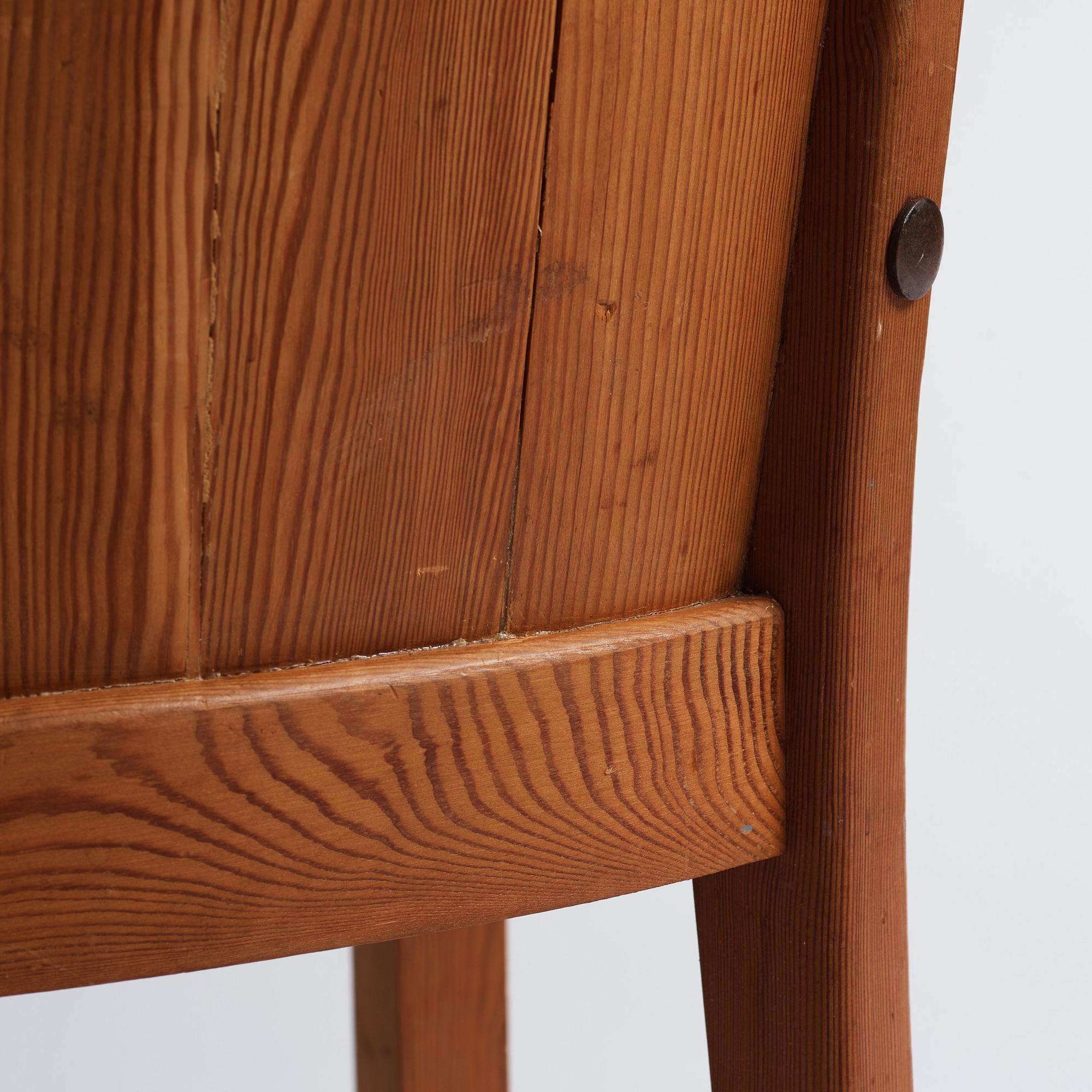 Axel Einar Hjorth, a pair of stained pine 'Lovö' chairs, Nordiska Kompaniet, Sweden 1930s.