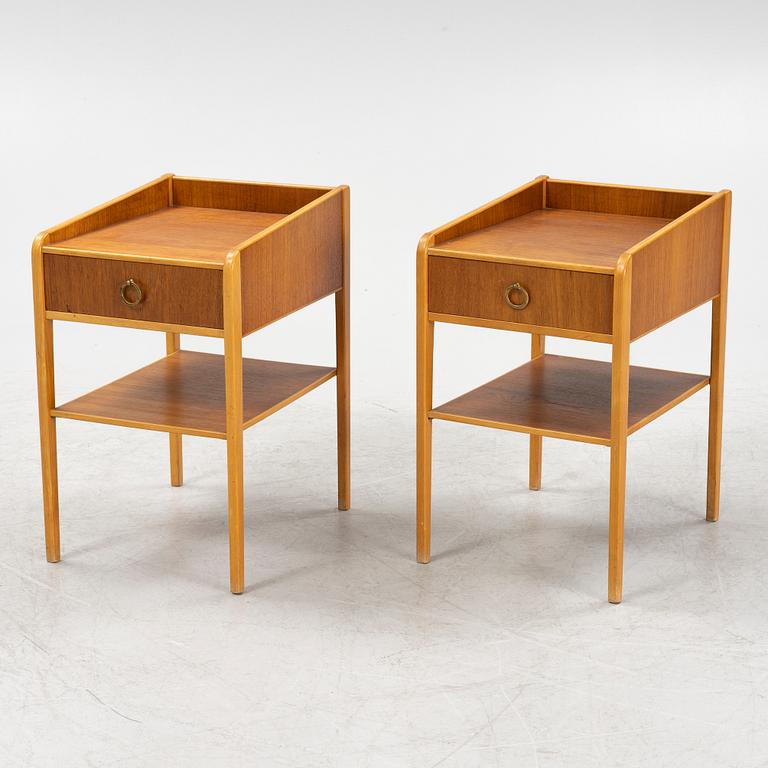 A pair of teak veneered bedside table, mid 20th Century.