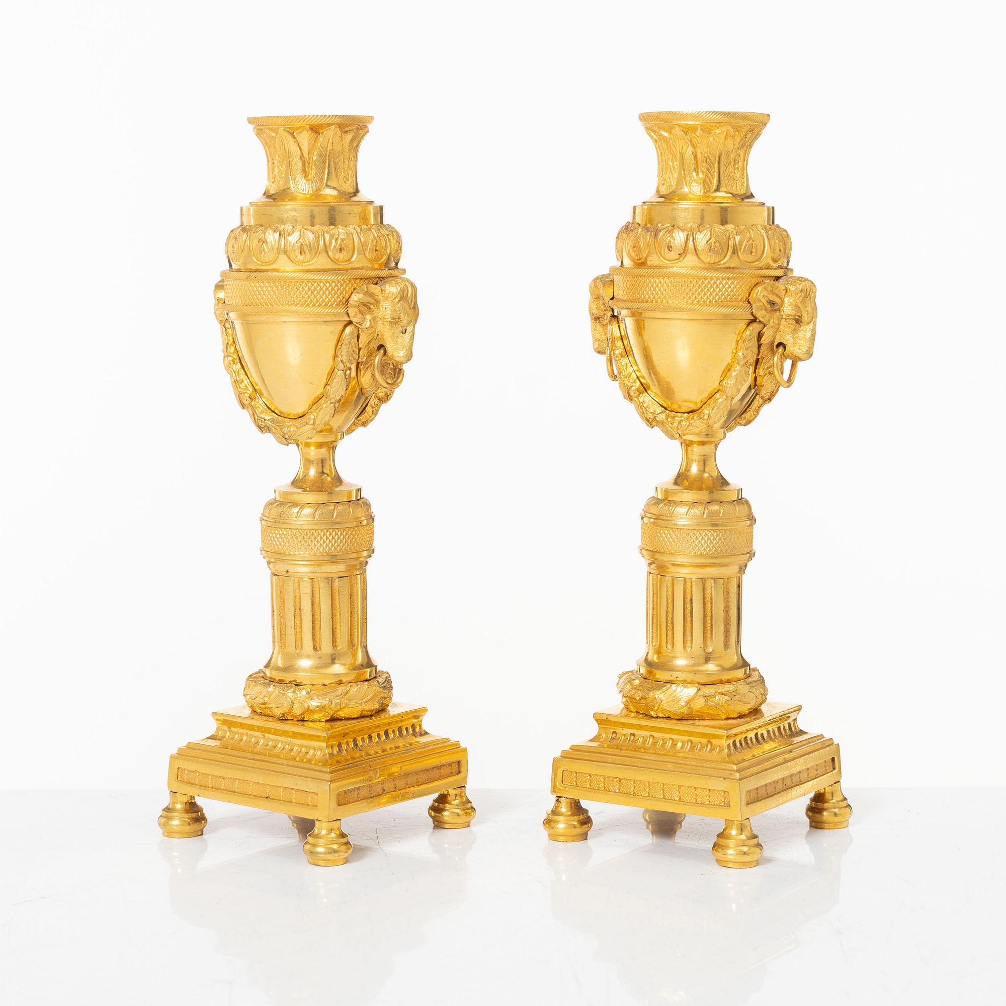 A pair of French Louis XVI style gilt-bronze casolettes, later part 18th century.