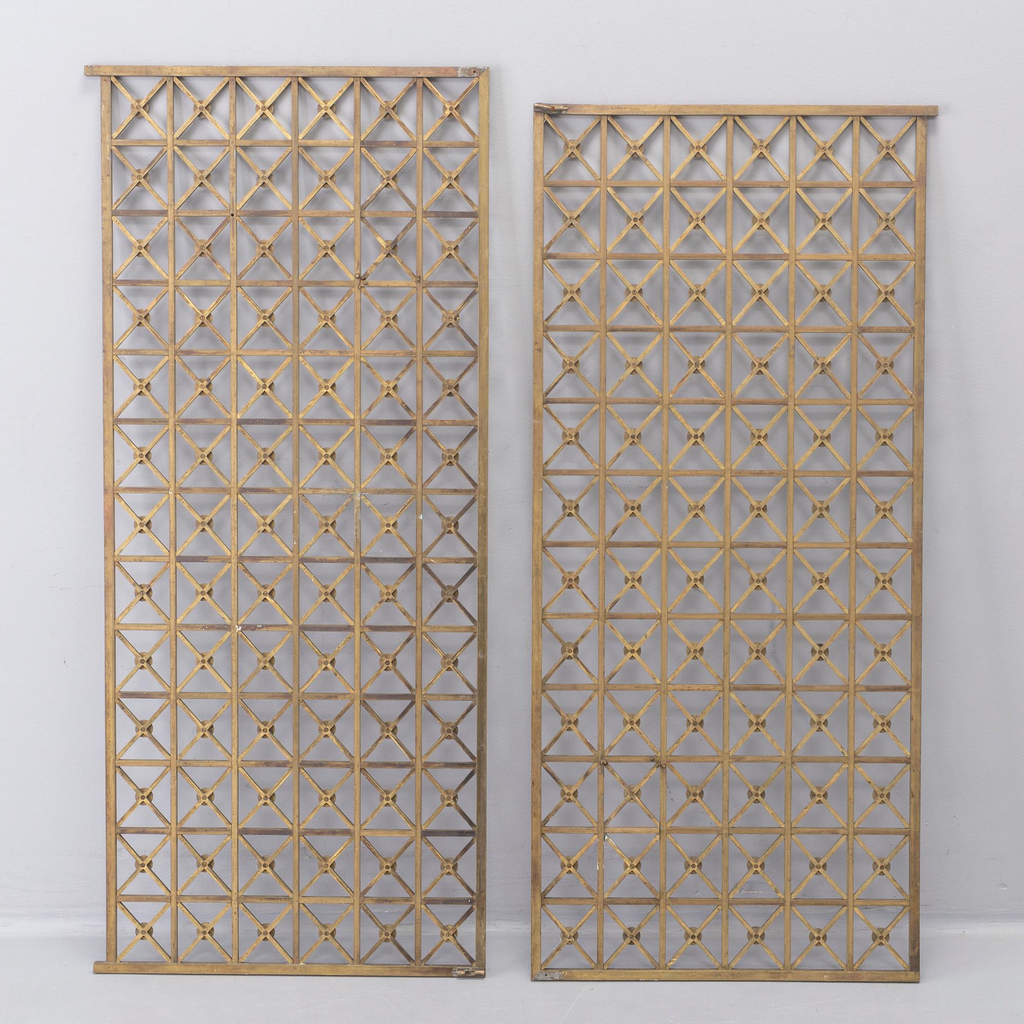 a pair of brass radiator covers, early 20th century.