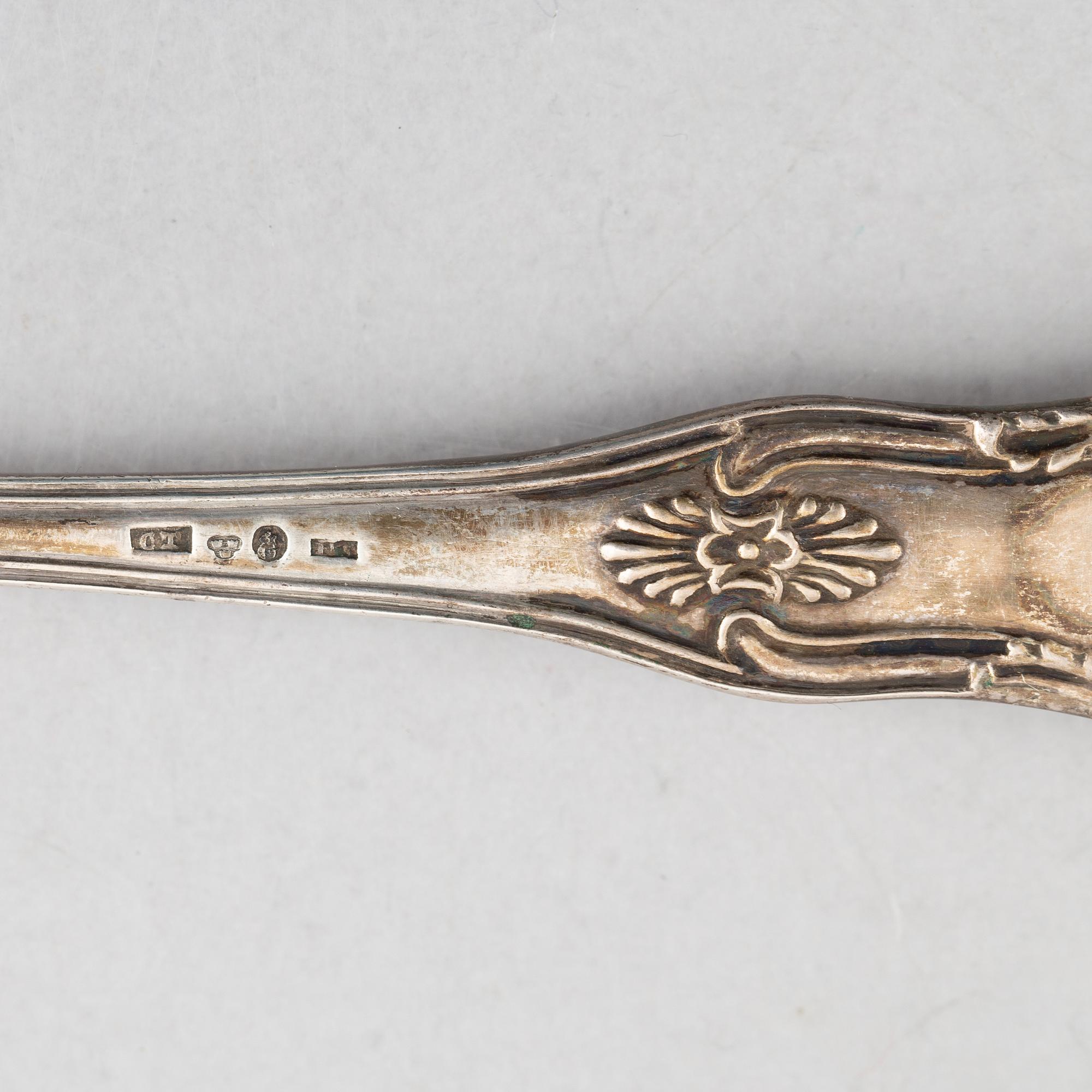 A Set of Silver Spoons and a Server, 18th-20th Century (5 pieces).