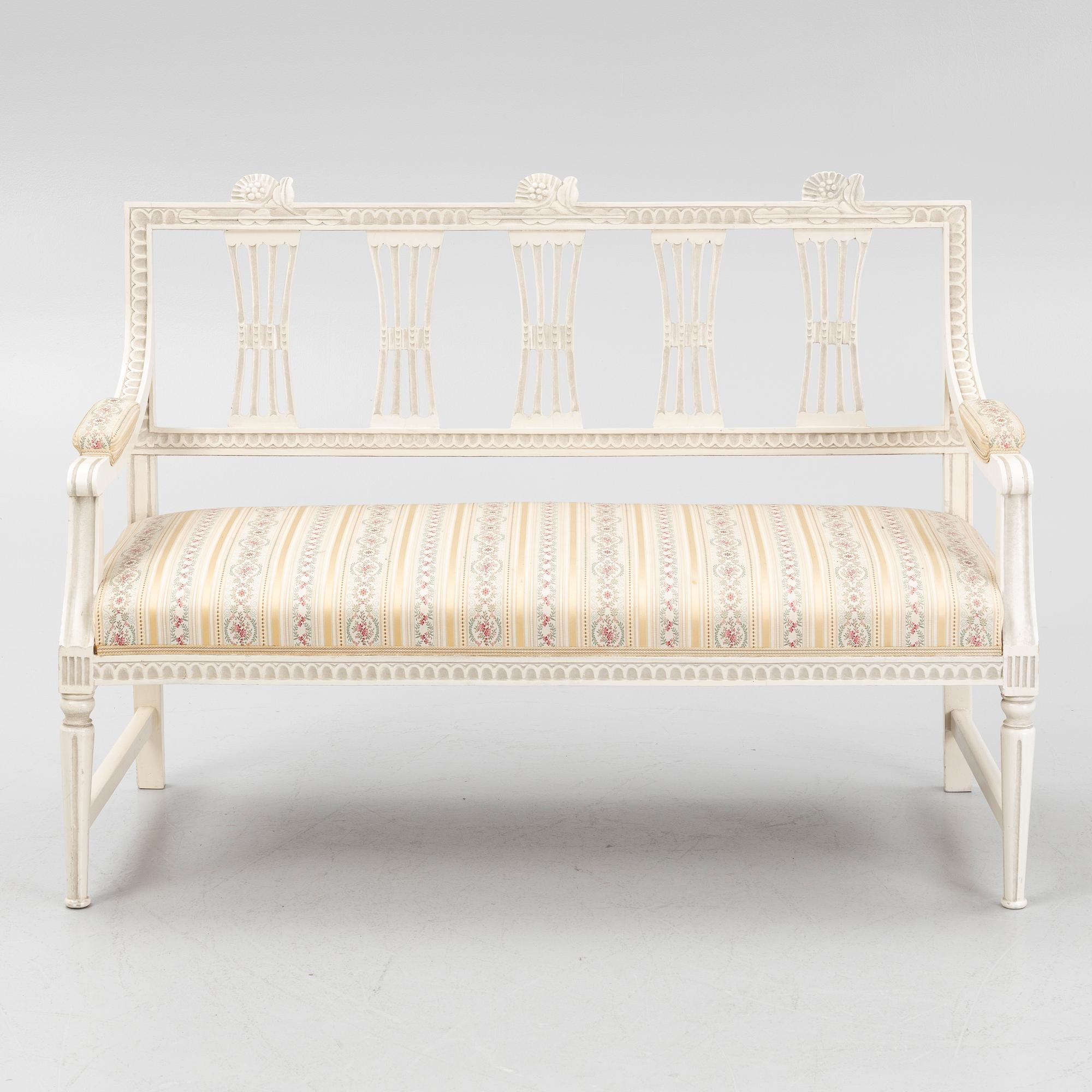 A sofa, three chairs and a table, Gustaivan style and of the Gustavian period, 19th-20th century.