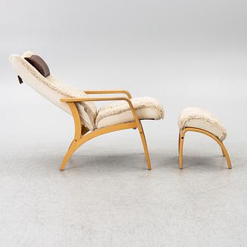 A 'Delta Adventure' armchair with footstool, Brunstad AS, Norway.