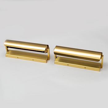 NORDISKA KOMPANIET, a pair of brass wall lights, second half of the 20th Century.