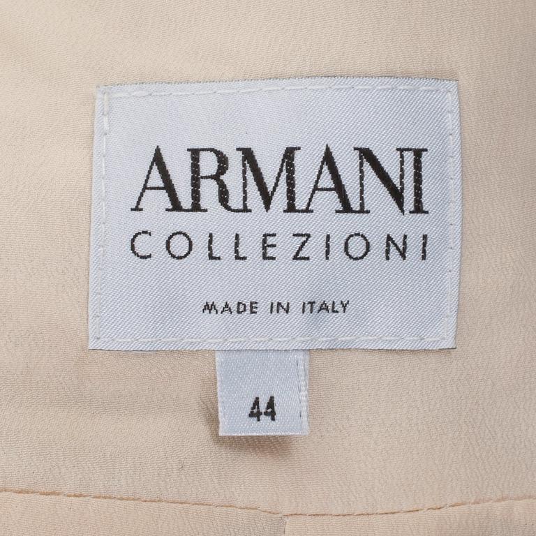 ARMANI, a silver and gold colored evening jacket. Italian size 44.