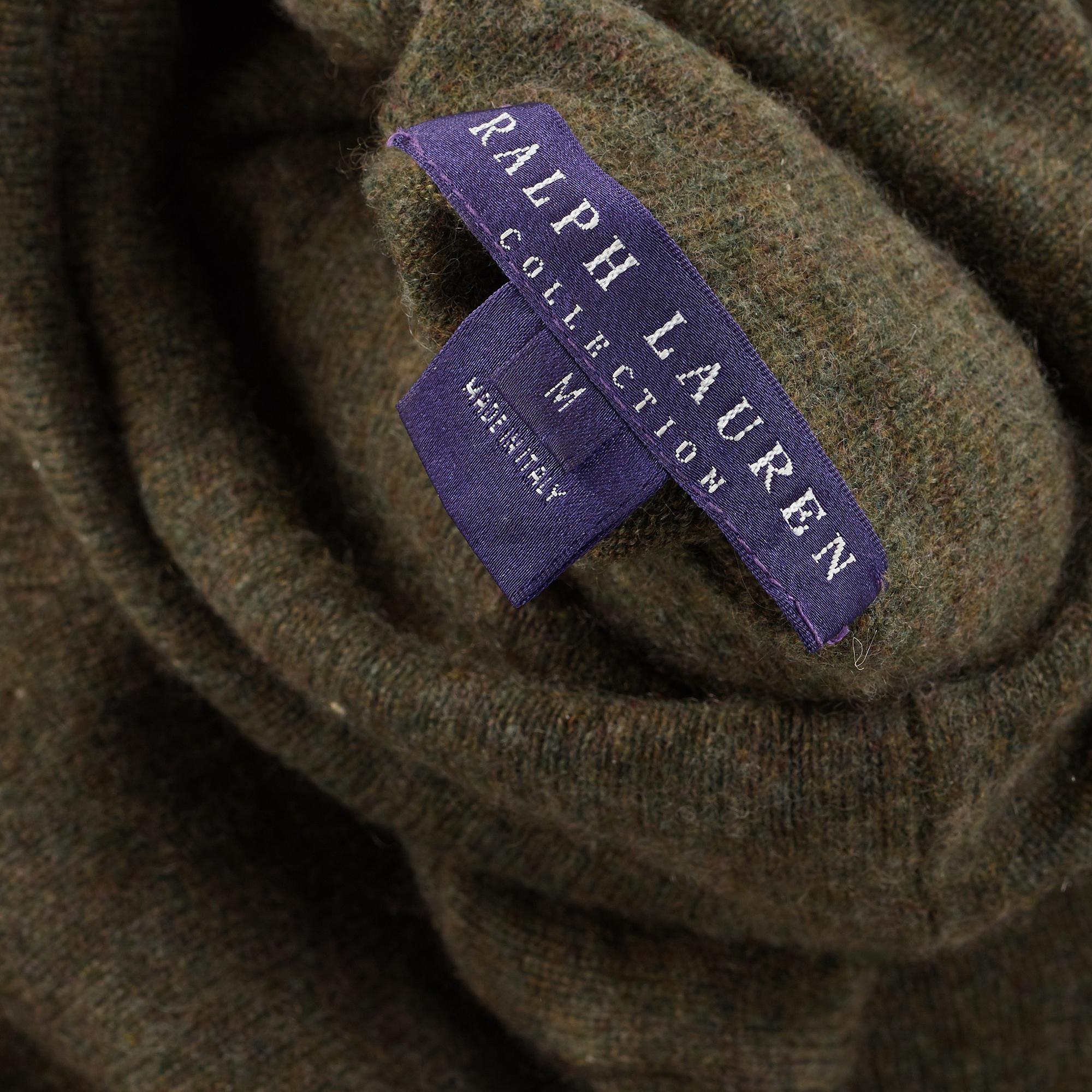 Green wool jacket and a turtleneck by Ralph Lauren.