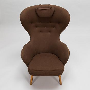 Carl Gustaf Hiort af Ornäs, A mid-20th-century armchair 'Siesta' manufacturer Puunveisto Oy - Träsnideri Ab, Finland.