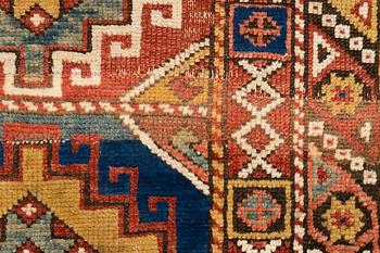 A rug, antique Bergama, ca 199-202 x 154-158 cm (and 2,5-3 cm "flat weave" at the ends),