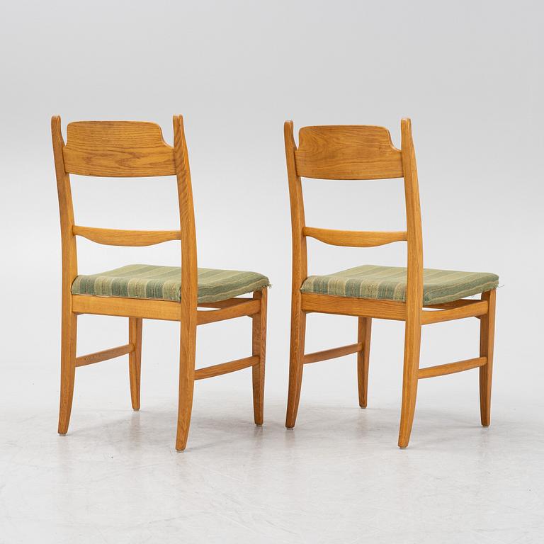 Carl Malmsten, a dining table and four chairs, 'Calmare nyckel', Åfors Möbelfabrik, second half of the 20th century.