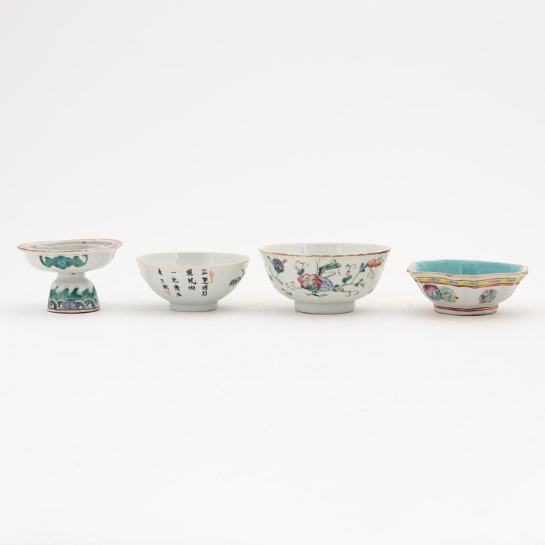 A set of three famille rose bowls, a footed dish, a spoon and a stemcup, late Qing dynasty, 19th century.