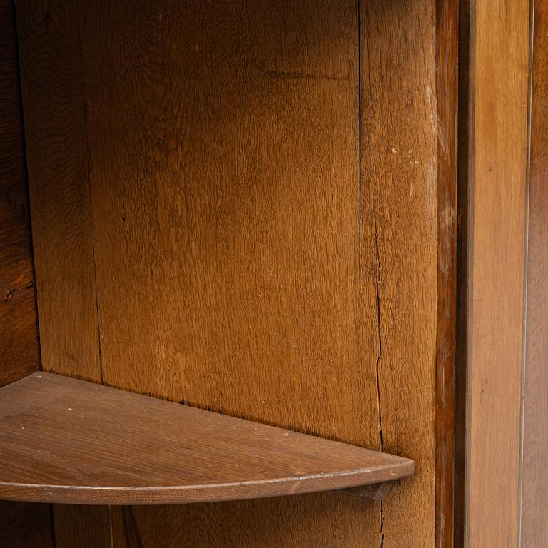 A pair of mahogany veneered empire style cabinets.