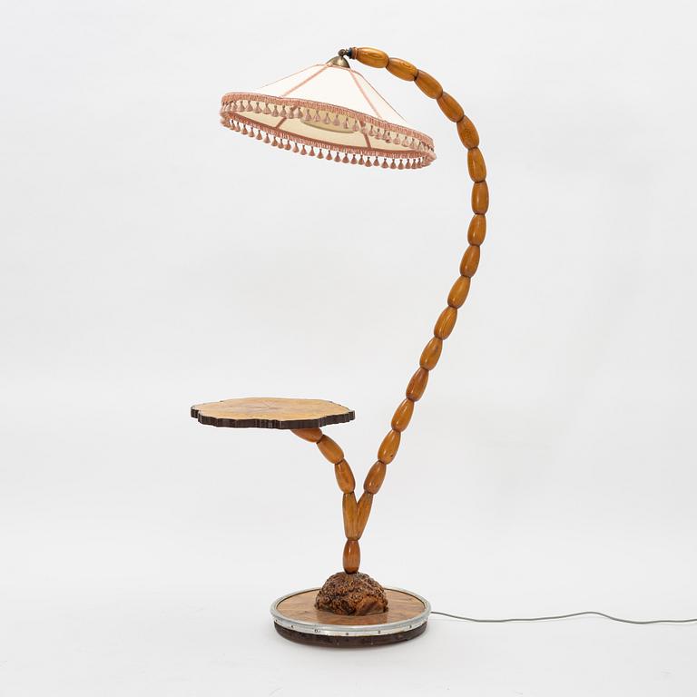 A floor lamp with table, 1940's.