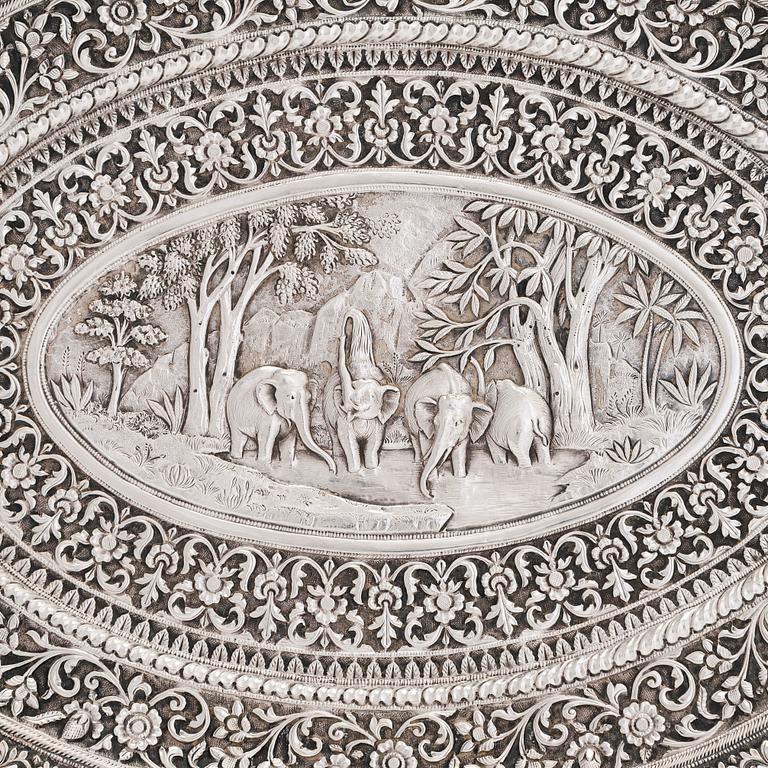 A silver salver, marked OM BHUJ for Oomersi Mawji, Bhuj, Kutch, India, circa 1860-1890.