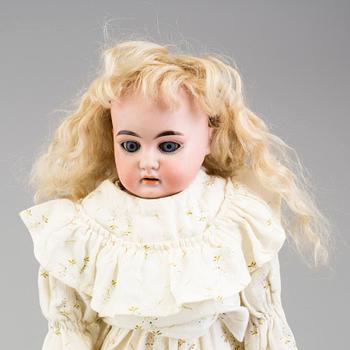 a Armand Marseille porcelain doll from around 1900.