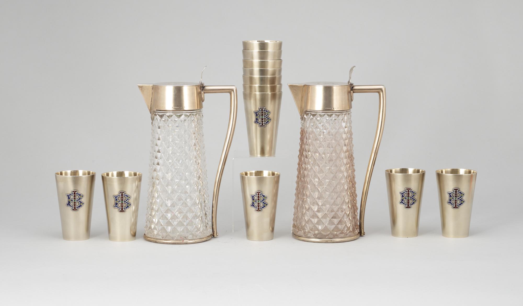 KARAFFER, ett par samt MUGGAR, 12 st, silver. C.G.Hallberg, Stockholm 1897-98.