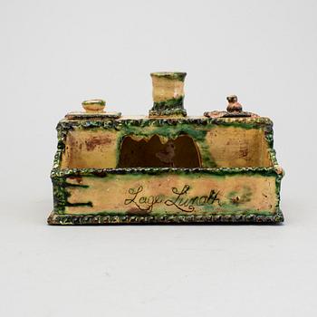 A 19th century pottery ink stand.