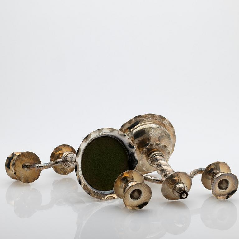 C.G. Hallberg, Pair of candelabra, silver, Stockholm, 1927.