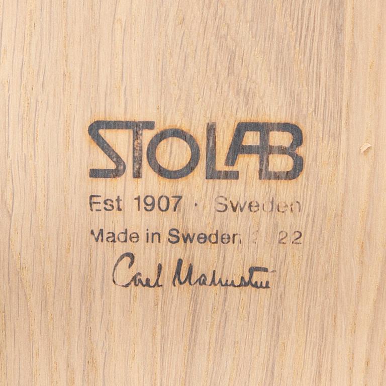 A set of two Carl Malmsten "Lilla Åland" chairs from Stolab, contemporary.