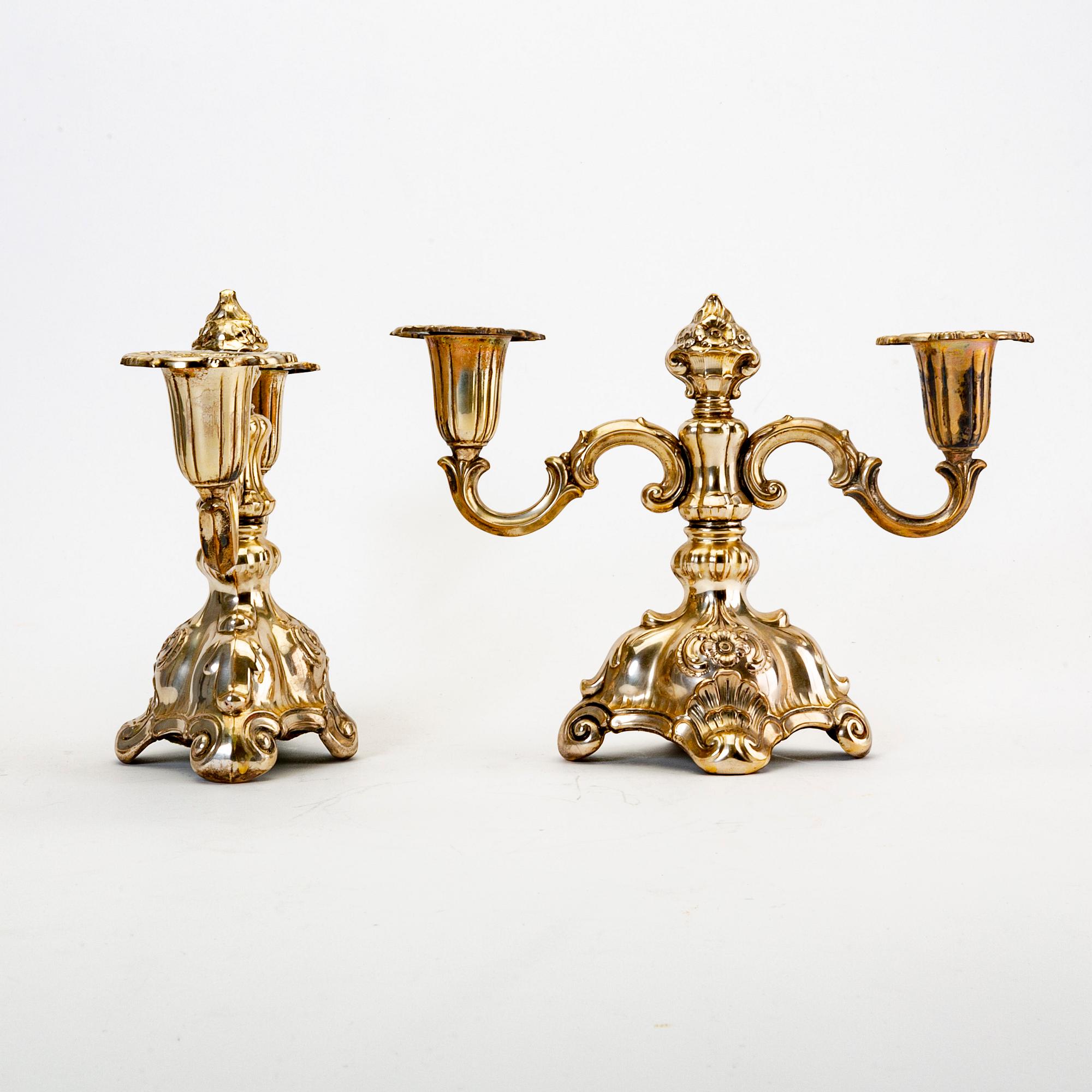A pair of Swedish 20th century silver candelabras mark of CG Hallberg Stockholm 1939.