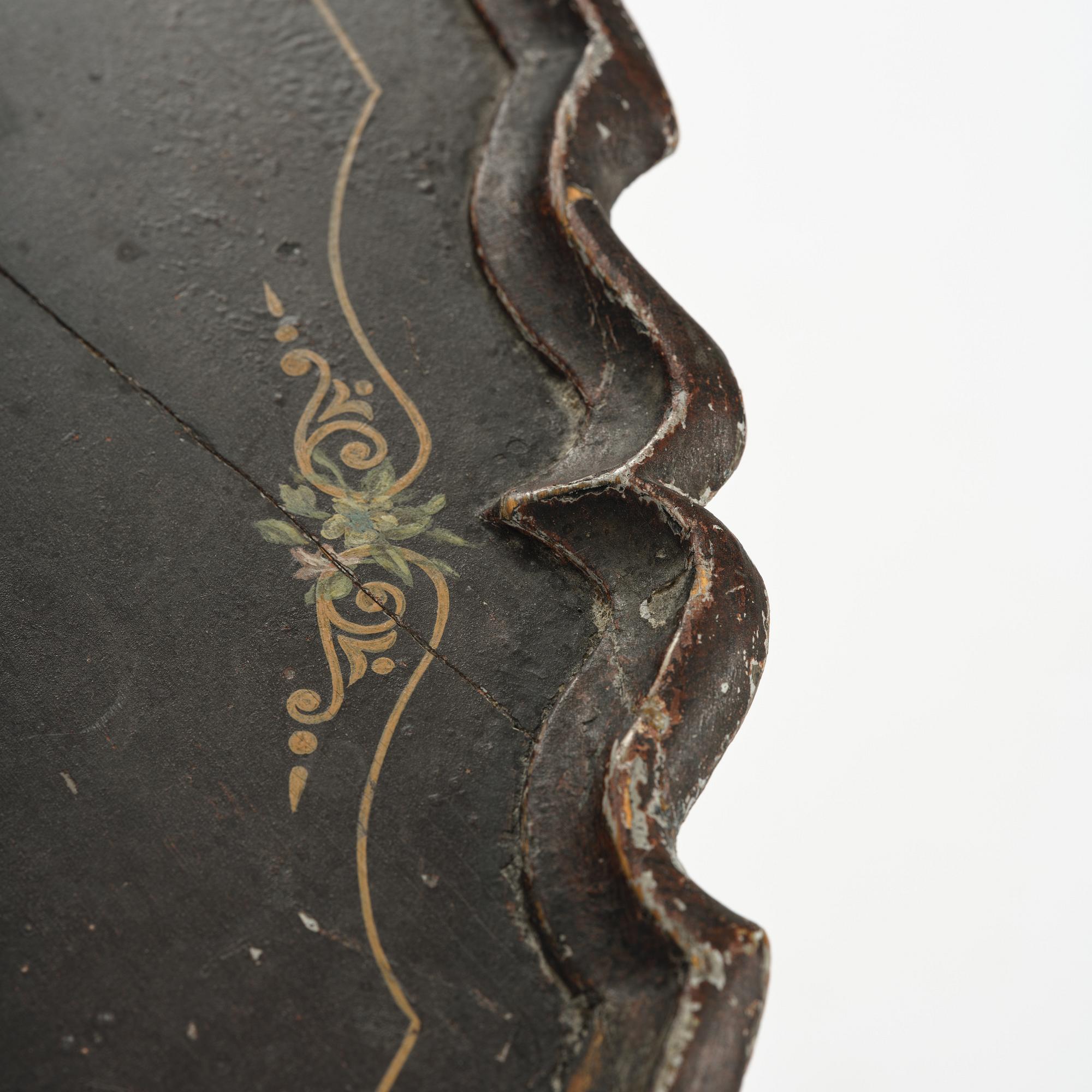 A Swedish late baroque japanned tilt-top tea table, mid 18th century.