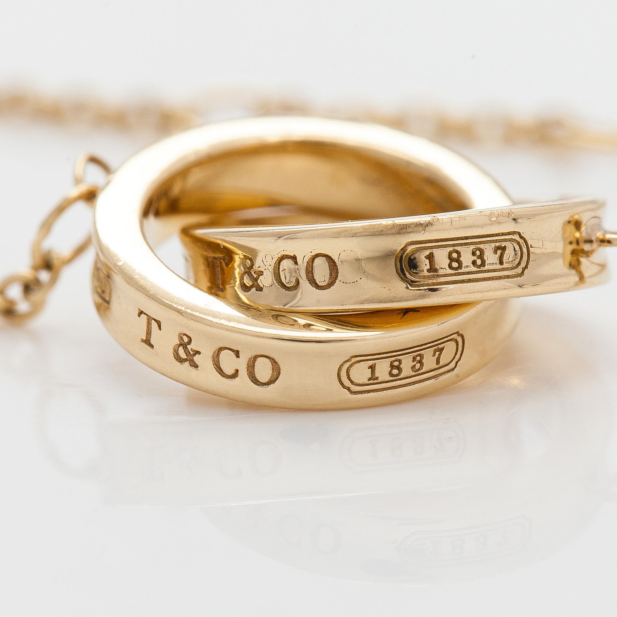 Tiffany & Co, rannekoru  "Interlocking Circles" 18K kultaa.
