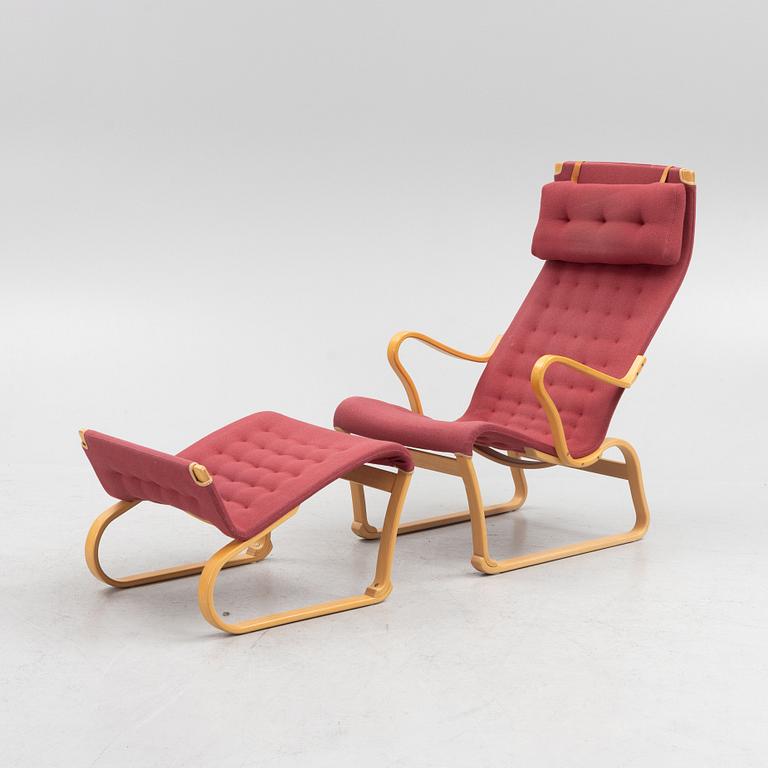 Bruno Mathsson, a 'Migo' armchair with a foot stool, Mathsson International, Värnamo.