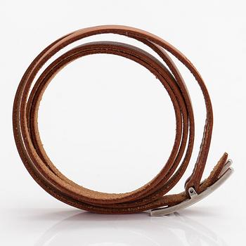 Hermès, a leather and silver coloured metal bracelet. Marked Hermès Paris.