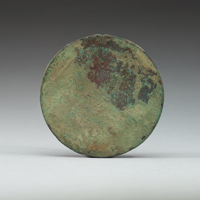 A gilt bronze mirror, Tang dynasty.