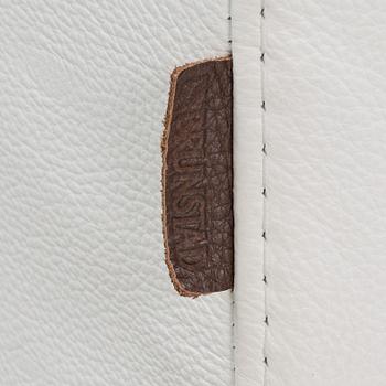 Helge Taraldsen, an 'Amanda' leather easy chair and ottoman, Brunstad, Norway, 2014.
