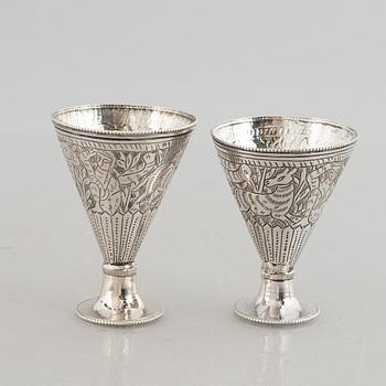 A silver 800 tray and coffee pot, and six glasses without marks. Probably Egypt.
