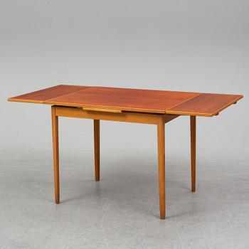 A 1950/60's teak dining table.