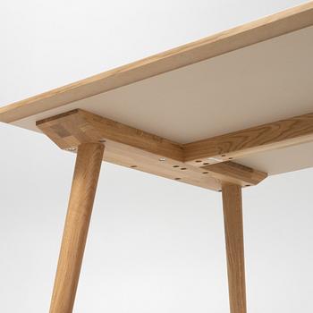Sami Kallio, an oak veneered 'In Between' dining table from &tradition.