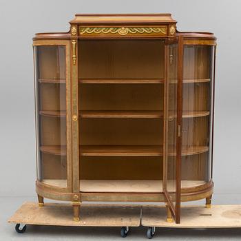 A DISPLAY CABINET, gustavian style, signed with label: "Gustaf L Sahlholm Snickare i Stockholm 25/5 1910".