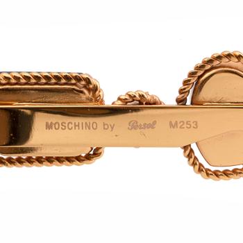 MOSCHINO, a pair of sunglasses.