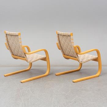 ALVAR AALTO, Pair of model '406' armchairs for Artek, late 20th century.