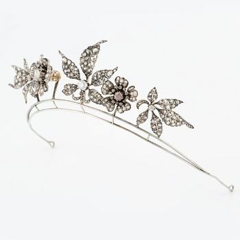 A silver and gold tiara with old-cut and rose-cut diamonds.