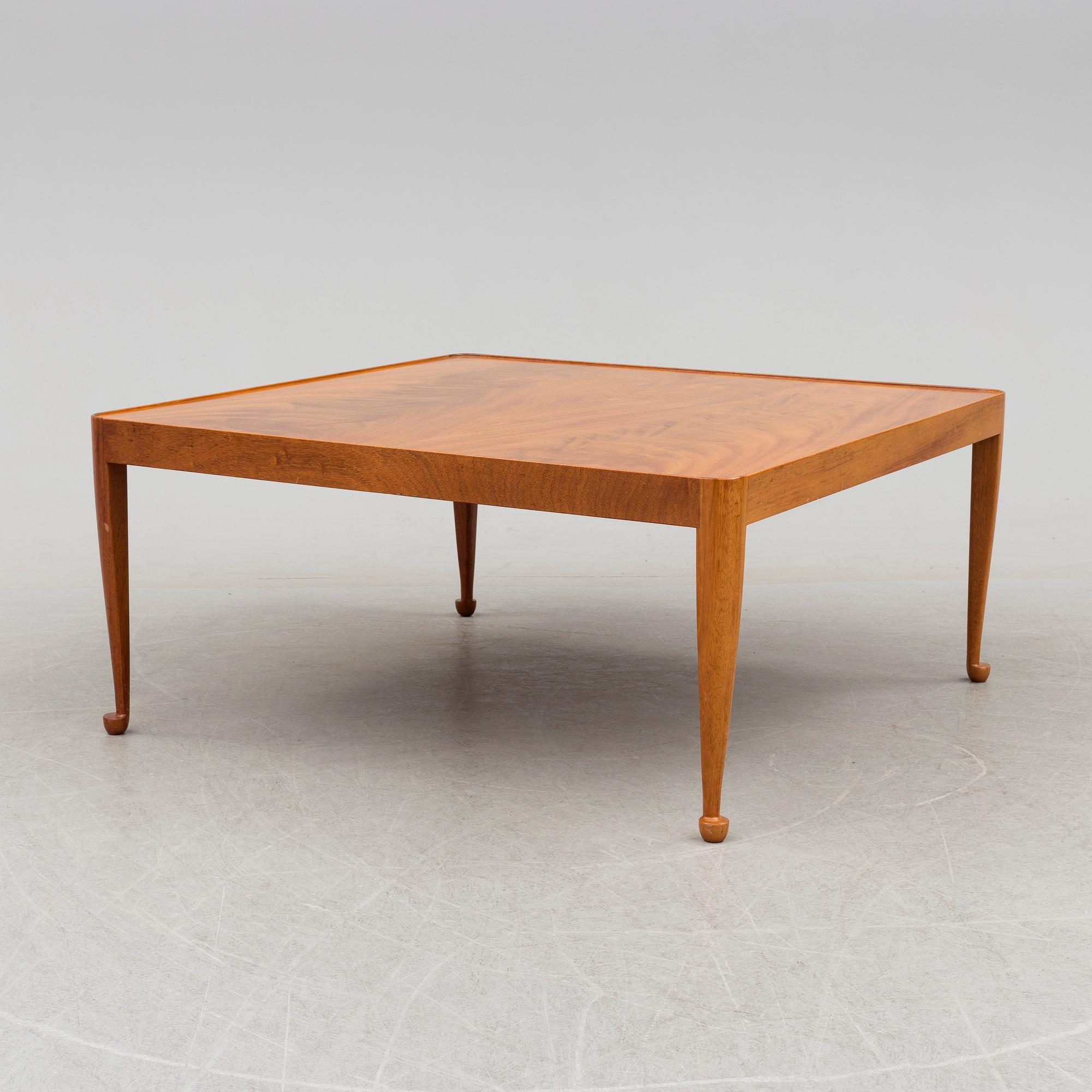 A second half of the 20th cnentury 'Diplomat' coffee table by Josef Frank for Firma Svenskt Tenn.