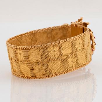 Armband 18K guld med rubiner.