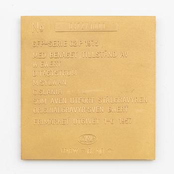 Plaque, 18K gold, numbered 372/1000, 1975, weight approx. 27 g.